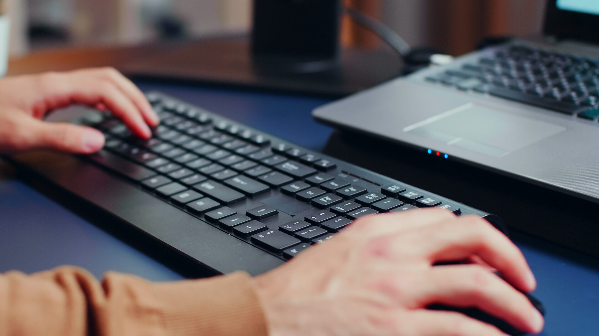 Close up of engineer hands typing on keyboard-overt-homepage-ssoproduct baner
